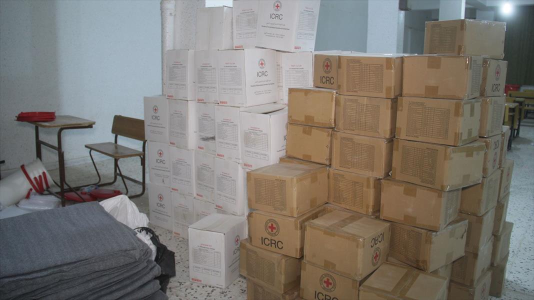 الهلال الأحمر الليبي يوزع مساعدات إنسانية على نازحي جالو