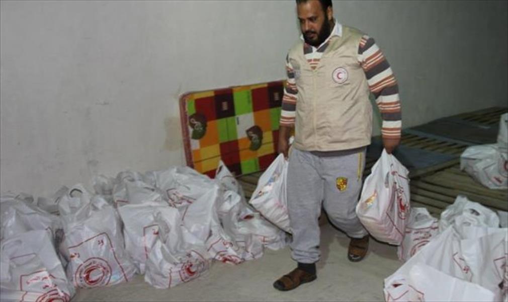 الهلال الأحمر بسرت يوزع مساعدات إنسانية على مائة أسرة محتاجة