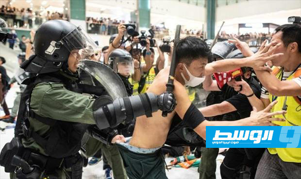 مواجهات عنيفة بين الشرطة ومحتجين في هونغ كونغ في ختام تظاهرة جديدة مناهضة للحكومة
