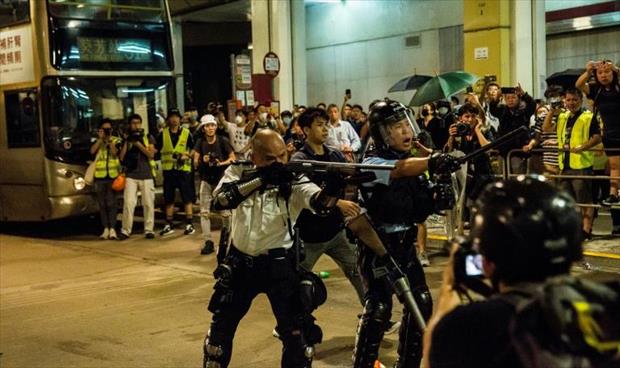 صدامات في هونغ كونغ إثر توجيه تهمة «أعمال» شغب لمتظاهرين