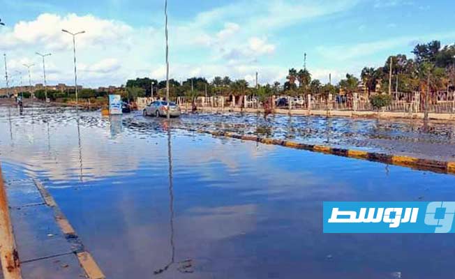 Rainwater floods the streets of Sirte