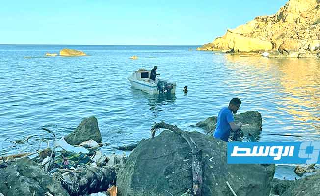 Two bodies and three bags of human remains recovered from flood-hit areas of eastern Libya