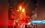 وفاة 21 فلسطينيا في اندلاع حريق بمبنى سكني في قطاع غزة