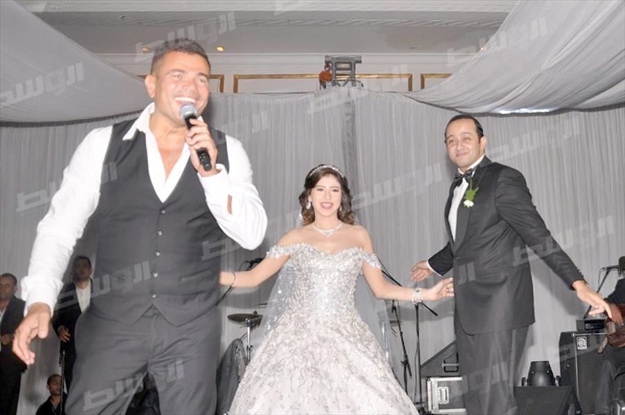 بالصور: عمرو دياب يحيي حفل زفاف نرمين وبسام
