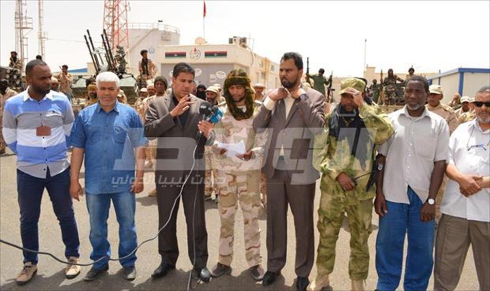 القوة الثامنة تعلق اعتصامها وتعيد فتح مستودع سبها النفطي