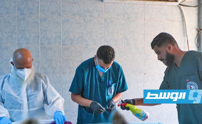 أخذ عينات الحمض النووي من جثة مجهولة بمستشفى صبراتة التعليمي