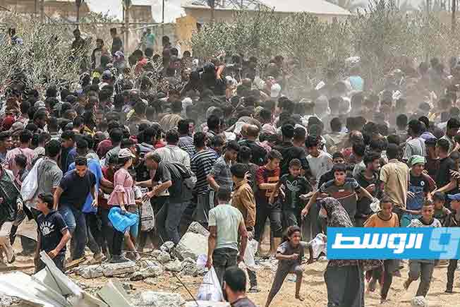 الدفاع المدني: 20 شهيدا جراء انقلاب شاحنة مساعدات في غزة