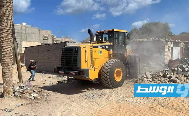 بالصور.. الحرس البلدي ينفذ حملة لإزالة المباني المخالفة