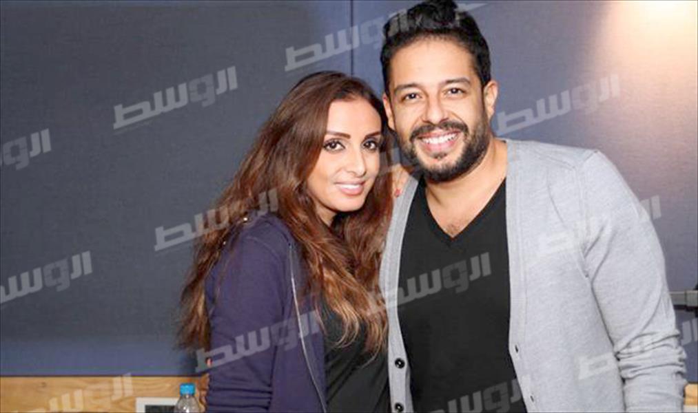 بالصور: محمد حماقي وأنغام معًا في «بتعدي السنين»