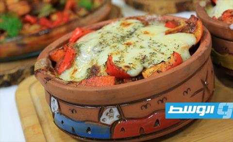 طاجن دجاج بالمشروم والصلصة