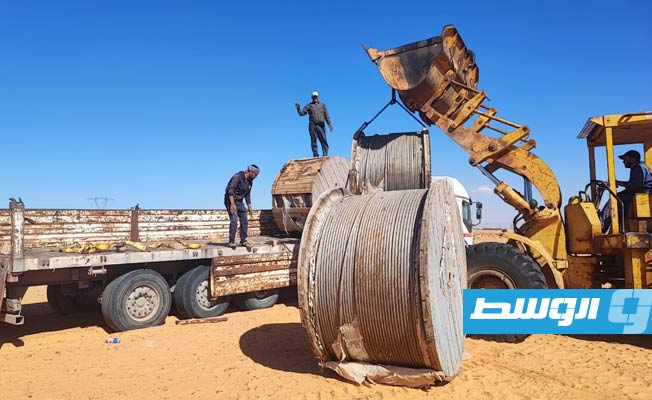 نقل أسلاك وعوازل لمشروع خط نقل الطاقة الرويس- أبوعرقوب