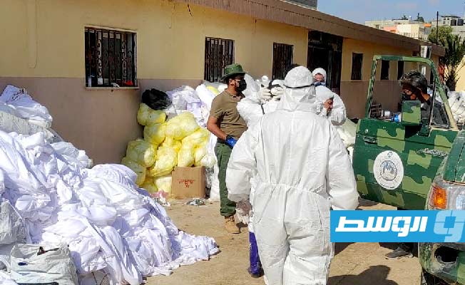 تعقيم مواقع تجميع الجثث في درنة