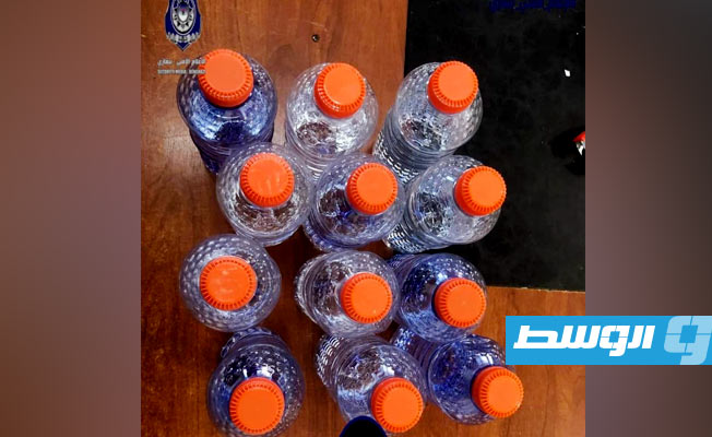 مديرية أمن بنغازي: ضبط نيجيري بحوزته خمورا محلية الصُنع