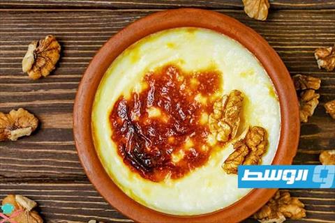 أرز بالحليب والزبدة والقشدة في الفرن