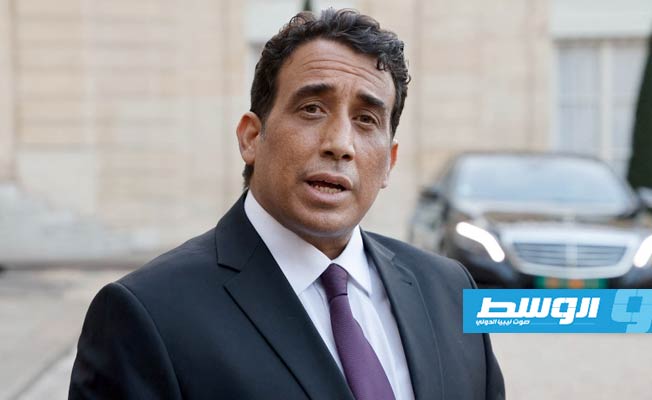 المنفي يصل برلين للقاء ميركل