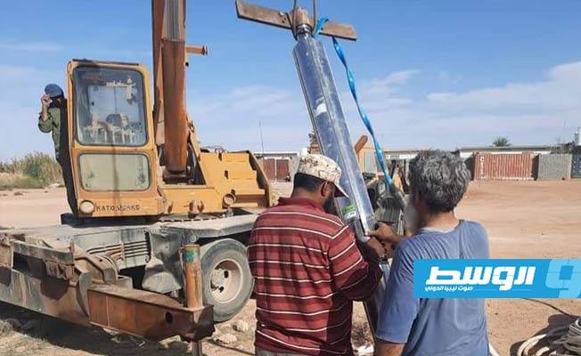 صيانة وتأهيل بئر مياه بمخيم لنازحي تاورغاء جنوب بني وليد