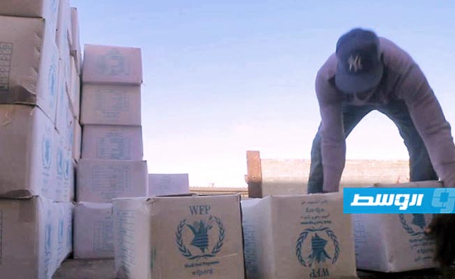 توزيع مساعدات غذائية على 450 عائلة نازحة ومحتاجة في بني وليد