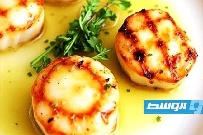 إسكالوب مشوي مع صوص الزبدة والليمون