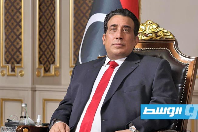المنفي يصدر قراراً بحظر المظاهر المسلحة في طرابلس