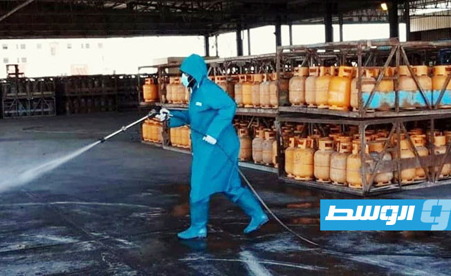 تعقيم إسطوانات غاز الطهي بمستودع الزاوية النفطي