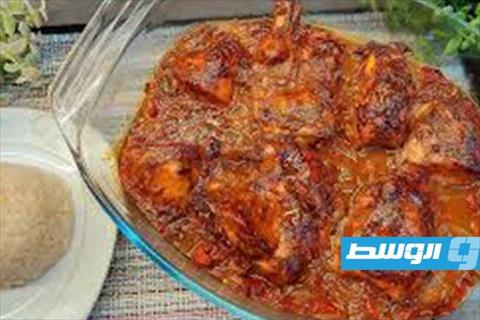 دجاج بخلطة التوابل والطماطم في الفرن